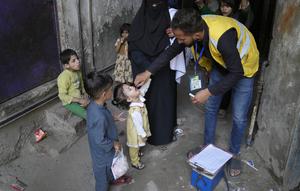 Pakistan dan negara tetangganya, Afghanistan, adalah satu-satunya negara di mana penyebaran polio tidak pernah bisa dihentikan. (AP Photo/K.M. Chaudary)