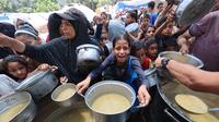 Warga di jalur Gaza yang masih bertahan untuk hidup terus dihantui dengan bencana kelaparan. (Eyad BABA/AFP)