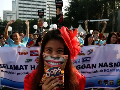 Parade Hari Pelanggan Nasional (Harpelnas) 2016 di Kawasan Bundaran Hotel Indonesia, Jakarta, Minggu (4/9). Kegiatan tersebut sebagai bentuk kepedulian bersama kepada pelanggan. (Liputan6.com/Johan Tallo)