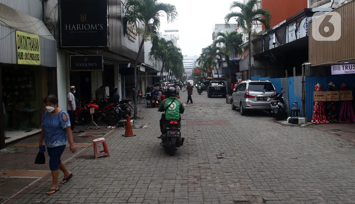 Suasana kawasan Pasar Baru, Jakarta, Kamis (22/9/2022). Kompleks Jalan Pasar Baru merupakan kawasan perdagangan yang telah berkembang sejak awal abad ke-19. Di dalam Kompleks Jalan Pasar Baru, terdapat beberapa bangunan dan struktur yang telah ditetapkan sebagai cagar budaya sebelumnya. (Liputan6.com/Helmi Fithriansyah)