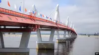 Peresmian jembatan perbatasan pertama di atas sungai Amur (Heilongjiang) yang menghubungkan kota Blagoveshchensk di Rusia dan kota Heihe di China, 10 Juni 2022. (Foto: Handout / Layanan pers Pemerintah wilayah Amur / AFP)