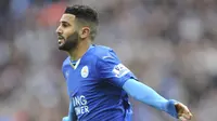 Riyad Mahrez saat merayakan gol ke gawang Swansea City pada laga Premier League di King Power Stadium, Leicester, (24/4/2016).   (AP/Rui Vieira, File)