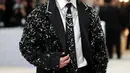 Sayangnya, Kun, sapaan akrabnya, keliru dikenali sebagai tiga selebritas Asia yang berbeda oleh outlet berita besar, seperti Vogue, GQ, dan USA Today. (Photo by Mike Coppola / GETTY IMAGES NORTH AMERICA / Getty Images via AFP)