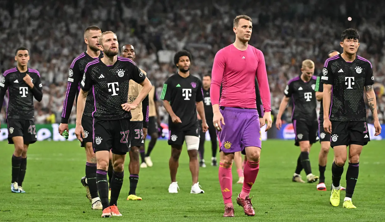 Die Bayern kalah dengan agrerat 3-4 dari Real Madrid dan gagal berlaga di partai puncak Liga Champions 2023/2024. (JAVIER SORIANO/AFP)