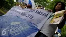 Massa dari Aliansi Masyarakat Tolak Kekerasan Seksual saat menggelar aksi dukungan untuk RUU Penghapusan Kekerasan Seksual di kawasan Patung Kuda, Jalan MH. Thamrin, Jakarta (8/12). (Liputan6.com/Gempur M Surya)