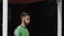 Kiper MU, David de Gea, tampak kecewa akibat kebobolan dua kali dari Bournemouth pada laga Liga Premier Inggris di Stadion Vitality, Inggris, Sabtu (12/12/2015). (AFP/Ian Kington)