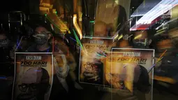 Koalisi Masyarakat Sipil Anti Korupsi bersama Wadah Pegawai melakukan aksi tutup mulut di Gedung KPK, Jakarta, Selasa (12/3). Pelaku penyerangan Novel Baswedan hingga sekarang pelaku penyiraman belom tertangkap. (merdeka.com/Dwi Narwoko)