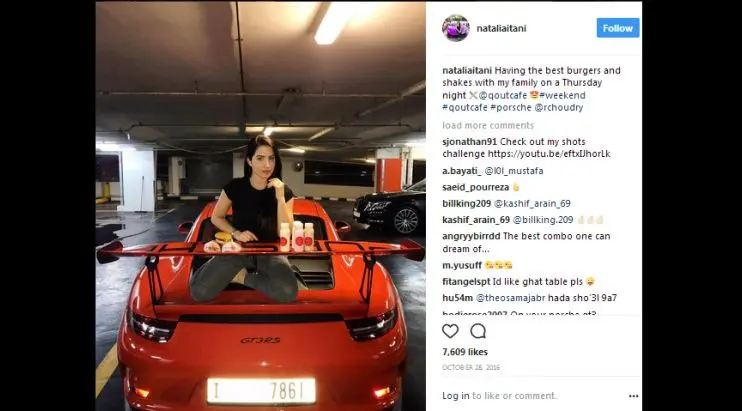 Pose Natalia dengan sebuah mobil dari Porsche. (instagram: @nataliaitani)