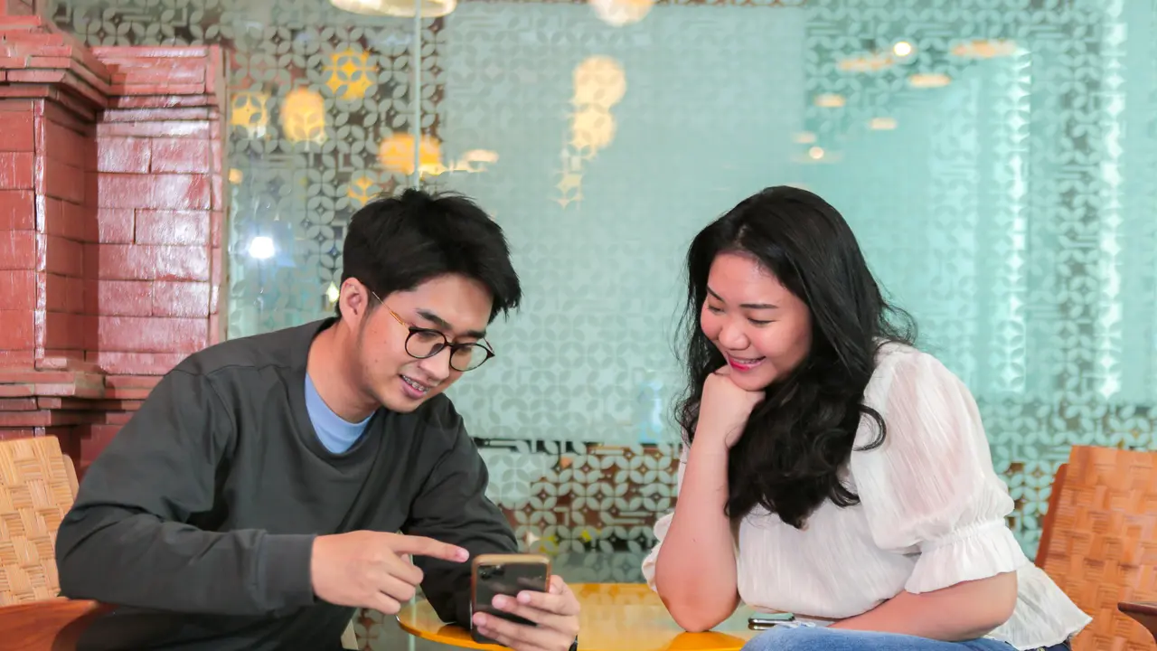 Ilustrasi foto pengguna dompet digital DANA