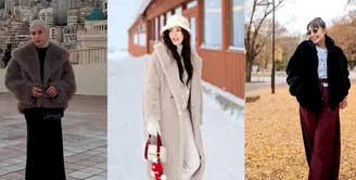 Nina Zatulini, yang sedang berlibur di Monako bersama keluarganya, tampil stylish dengan jaket fur musim dingin yang menutupi dress hitam. Ia memadukan penampilannya dengan kacamata, sepatu boots hitam, dan jilbab abu-abu, yang semakin memperkuat kesan trendi.