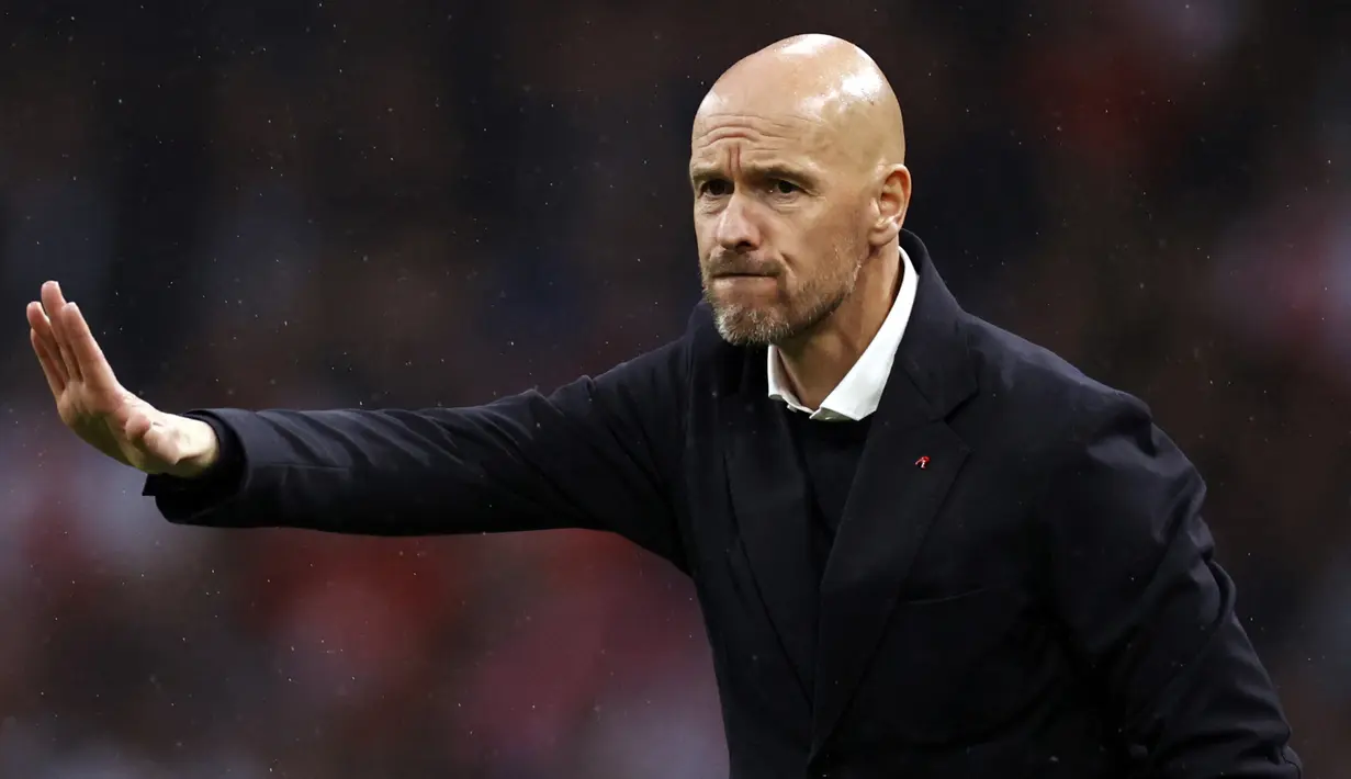 Erik ten Hag terus menyusun rencana ke depan bersama Manchester United untuk memperkuat skuat Setan Merah di musim 2022/2023. Terbaru, MU mengincar 5 pemain yang sebagian besar memiliki nostalgia bersama sang pelatih saat masih membesut Ajax Amsterdam. Berikut daftar lengkapnya. (AFP/ANP/Maurice van Steen)