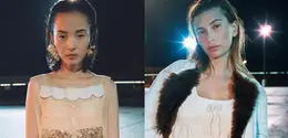 Miu Miu menggandeng Hailey Bieber untuk kampanye Fall/Winter 2026, memadukan nuansa 70-an dan awal 2000-an dalam visual sinematik dengan detail feminin. (Miu Miu)