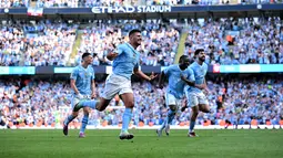 Phil Foden menjadi pahlawan kemenangan Man City dengan memborong dua gol dan satu assist untuk gol Rodri. (Oli SCARFF / AFP)