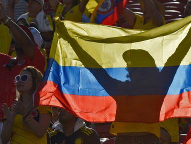 Suporter Kolombia merayakan gol yang dicetak timnya ke gawang AS dalam laga Copa America Centenario di Santa Clara, California, AS, (3/6/2016). (AFP/Mark Ralston)