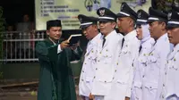 Sebanyak 89 Kepala Desa Terpilih menjalani sumpah jabatan dalam pelantikan di Sekretariat Daerah (Setda) Garut, Jawa Barat, hari ini. (Liputan6.com/Jayadi Supriadian)