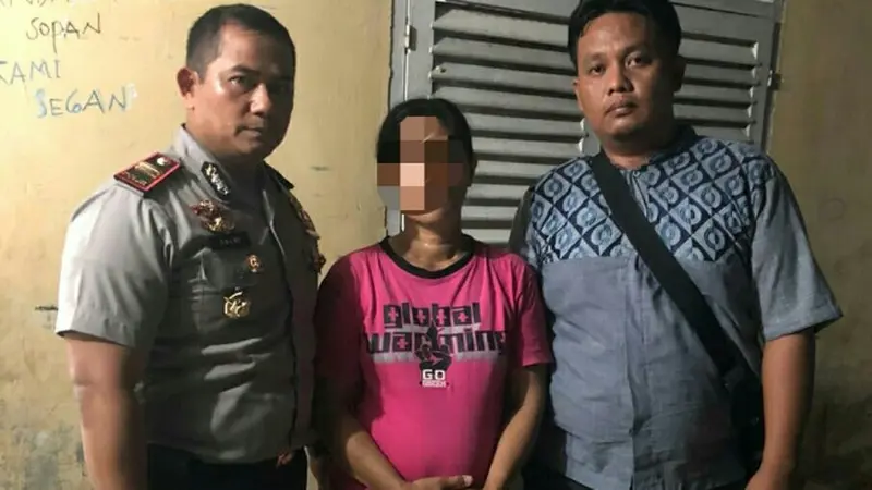 Istri yang bunuh suaminya ditangkap personel Polres Pelalawan.