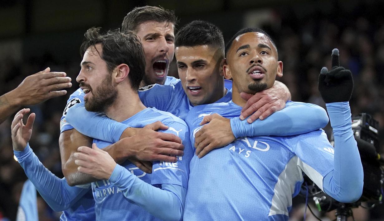 Berkat kemenangan ini The Citizens nyaman berada di puncak Grup A dengan 12 poin unggul delapan poin atas PSG di tempat kedua. Manchester City juga memastikan diri melenggang ke fase knock-out. (AP/Scott Heppell)