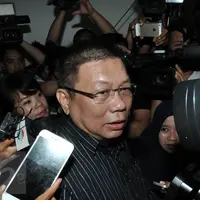 Pengacara Jessica Kumala Wongso, Yudi Wibowo Sukinto memberika keterangan saat kunjungi Polda Metro Jaya, Jakarta, (30/1). Yudi mengataka kliennya tidak melarikan saat memilih untuk menginap di suatu hotel. (Liputan6.com/JohanTallo)