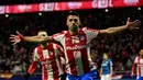 Hengkang dari Barcelona, Luis Suarez berlabuh ke sesama klub La Liga, Atletico Madrid. Selama dua musim membela Atletico Madrid mulai 2020/2021 hingga 2021/2022 ia sukses mencetak 34 gol dari total 83 laga di semua kompetisi. (AFP/Javier Soriano)