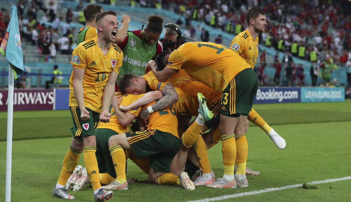Kemenangan Wales atas Turki 2-0 membawa Wales menjadi pemimpin klasemen sementara Grup A Euro 2020 (Euro 2021) dengan mengoleksi poin empat dari dua kali pertandingan. (Foto: AP/Pool/Tolga Bozoglu)