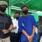 Jambret di depan masjid Pekanbaru yang membuat korbannya jatuh dan masuk ke parit. (Liputan6.com/M Syukur)