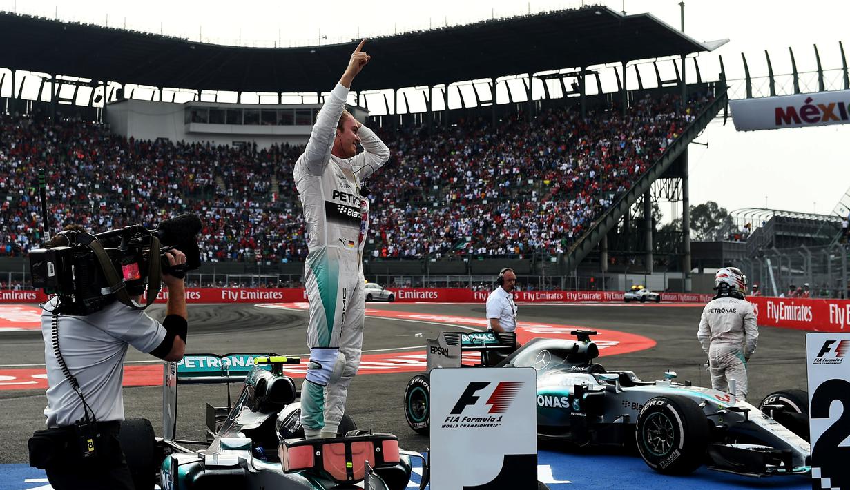 Ekspresi Nico Rosberg setelah finis pertama F1 GP Meksiko di Sirkuit Autodromo Hermanos Rodriguez, Senin (2/11/2015) dini hari WIB. (Getty Images/AFP/Lars Baron)