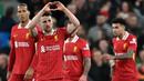 Pemain Liverpool, Diogo Jota merayakan gol ke gawang Everton dalam laga lanjutan Liga Inggris 2024/2025 di Anfield, Liverpool, Inggris, Rabu (02/04/2025) waktu setempat. (AFP/Paul Ellis)