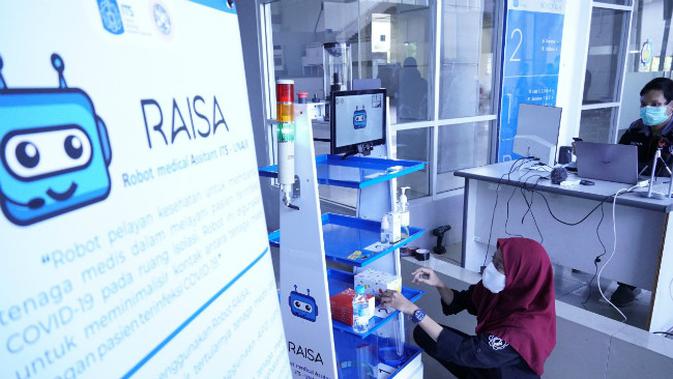 Institut Teknologi Sepuluh Nopember (ITS) berkolaborasi dengan Universitas Airlangga (Unair) meluncurkan Robot Medical Assistant ITS-Unair (RAISA). (Foto: Liputan6.com/Dian Kurniawan)