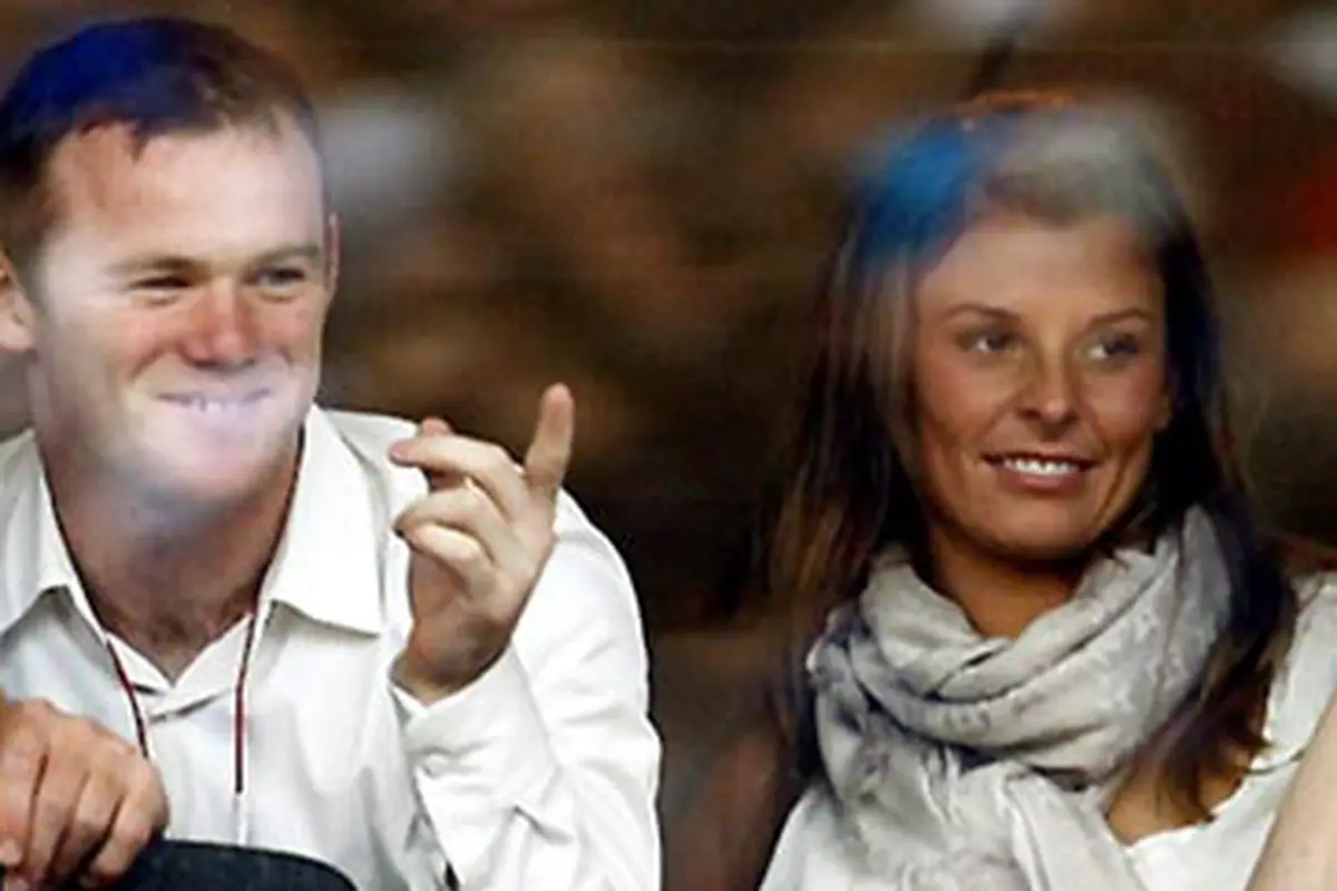Wayne Rooney dan istri, Coleen McLoughlin. (AFP/Paul Ellis)