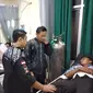 Dua petugas KPPS di Kabupaten Bogor, Jawa Barat pingsan saat penghitungan suara. (Liputan6.com/Achmad Sudarno)