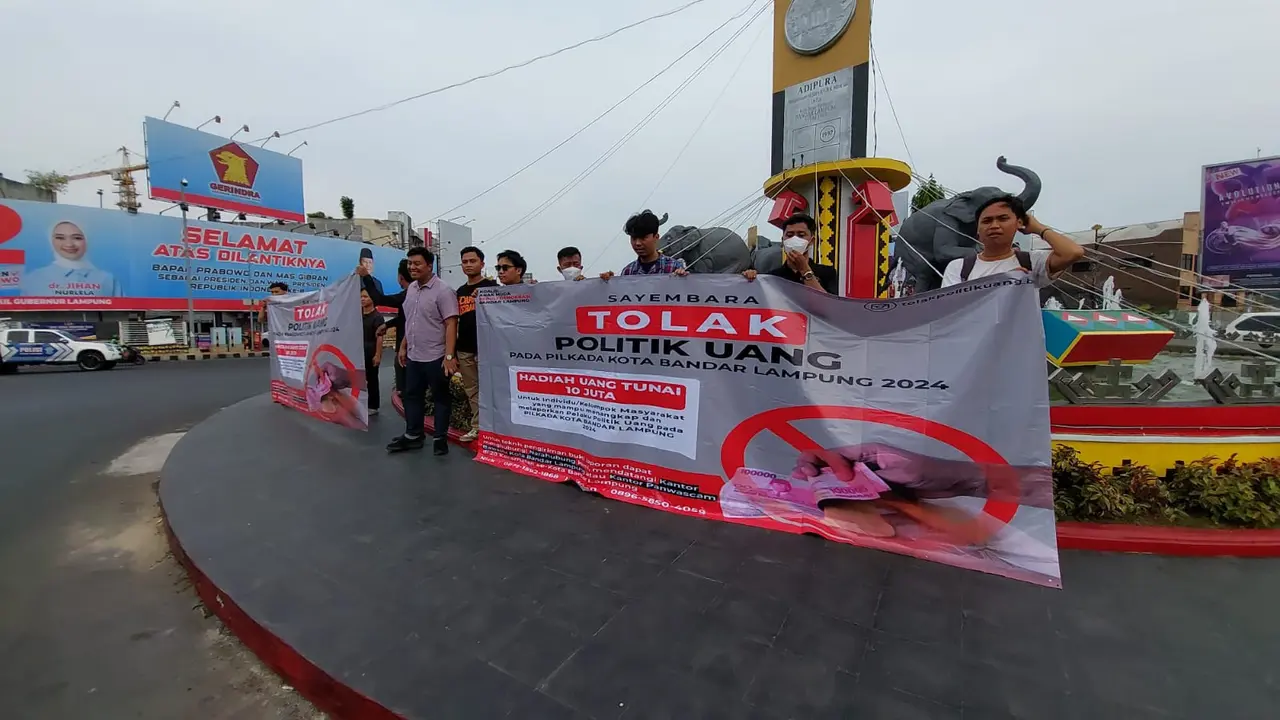 Aksi tolak politik uang di Pilkada 2024 Lampung. Foto : (Liputan6.com/Ardi).