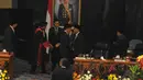 Jokowi saat mengucapkan selamat kepada Ketua DPRD DKI Prasetyo Edi Marsudi, Jakarta, (26/9/14). (Liputan6.com/Herman Zakharia)