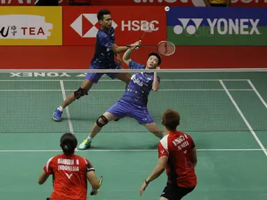 Pasangan Liliyana Natsir dan Tontowi Ahmad, saat melawan Riky Widianto dan Masita Mahmudin pada laga Indonesia Masters 2018 di Istora Senayan, Selasa (23/1/2018). Liliana/Tontowi menang 23-21 dan 21-17 atas Riky/Masita. (Bola.com/M Iqbal Ichsan)