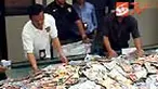 Polres Metro Jakarta Barat menyita ratusan keping DVD dan VCD porno mirip artis Ariel Peterpan dan Luna Maya, Ahad (13/6). Dari razia yang dilakukan di kawasan Glodok, Tamansari, Polisi juga menyita ribuan keping DVD porno lainnya, dan mengamankan lima te