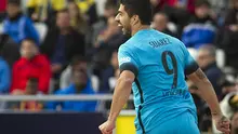 Luis Suarez setelah mencetak gol pembuka Barcelona atas Las Palmas, Sabtu (20/2/2016) / AFP