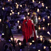Ha Hyun Woo, Lee Eun Mi, Jeon In Kwon, dan Ahn Ji Young di upacara pembukaan Winter Olympics 2018. (Foto: AFP / WANG Zhao)