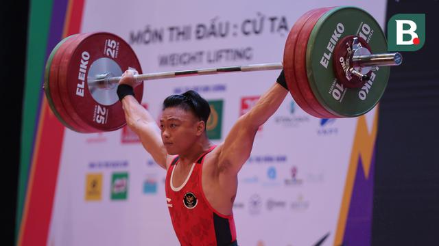Foto: Tampil Percaya Diri, Rahmat Erwin Abdullah Rebut Emas Angkat Besi di Kelas 73 kg Putra sekaligus Pecahkan Rekor SEA Games