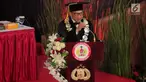 Kapolri Jenderal Tito Karnavian menyampaikan pidato pada pengukuhan sebagai guru besar untuk studi strategis kajian kontra terorisme di Sekolah Tinggi Ilmu Kepolisian Perguruan Tinggi Ilmu Kepolisian, Jakarta, Kamis (26/10). (Liputan6.com/Faizal Fanani)