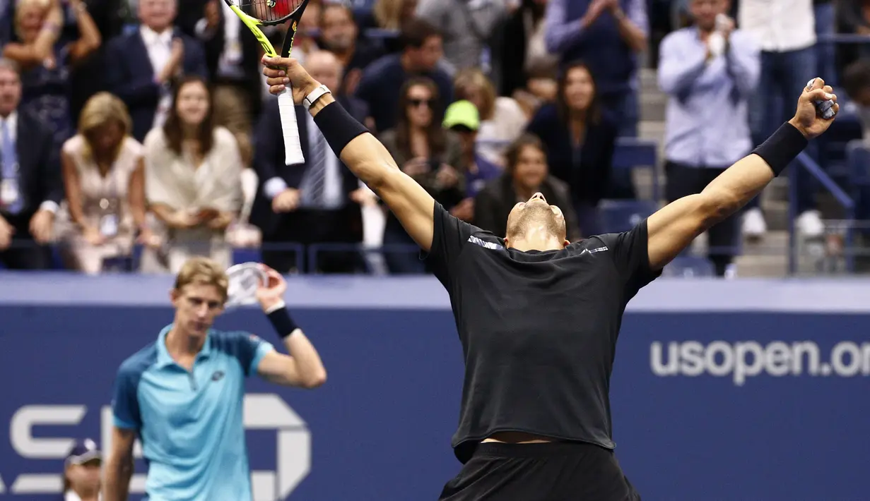 Ekspresi Rafael Nadal setelah mengalahkan petenis Afrika Selatan, Kevin Anderson pada final tunggal putra AS Terbuka 2017 di USTA Billie Jean King National Tennis Center,  New York, (10/9/2017). Rafael Nadal menang 6-3, 6-3, 6-4. (AP/Peter Morgan)