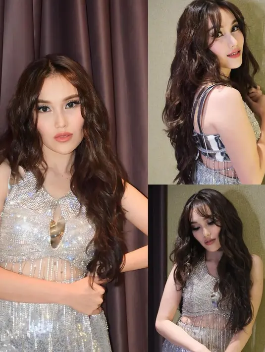 Rambut panjang dibuat model wave yang terlihat bervolume, dengan poni belah dua. Membuat Ayu semakin memesona.  [@ayutingting92]