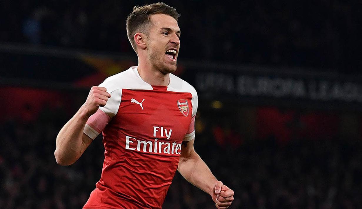 7. Aaron Ramsey - Gelar juara Liga Inggris yang tak kunjung diraihnya bersama Arsenal membuatnya memutuskan pindah ke Juventus. Bintang Wales ini statusnya bebas transfer saat memutuskan hijrah ke Serie A. (Photo by Ben STANSALL / AFP)