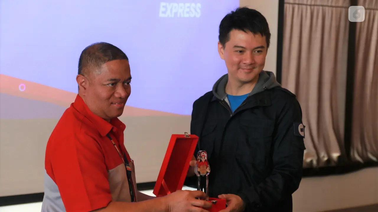 Vincent Iswara, CEO DANA dan M. Feriadi, Presiden Direktur JNE