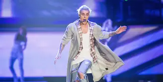 Justin Bieber, penyanyi Hollywood yang terkenal lewat single hit pertamanya, 'Baby'. Seiring berjalannya waktu, penyanyi polos ini semakin berubah dan sering bikin onar dan menjadi liar. (AFP/Bintang.com) 