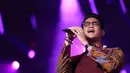 "Saya udah nggak sendiri (jomblo). Secepatnya (nikah). (Calonnya) Ada, Nanti tunggu undangannya yak," tambah Afgan. (Adrian Putra/Bintang.com)