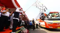 Khofifah memberangkatkan 90 bus pemudik tujuan berbagai kota Jatim dari Surabaya. (Dian Kurniawan/Liputan6.com)