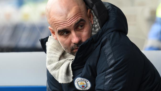 Pep Guardiola merasa Manchester City tampil buruk pada laga lanjutan Premier League yang berlangsung di stadion John Smith, Huddersfield, Minggu (20/1). Manchester City menang 3-0 atas Huddersfield. (AFP/Paul Ellis)