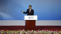 Presiden Jokowi diapit Presiden Amerika Serikat Obama dan Presiden China Xi Jinping, seolah-olah jadi rebutan.