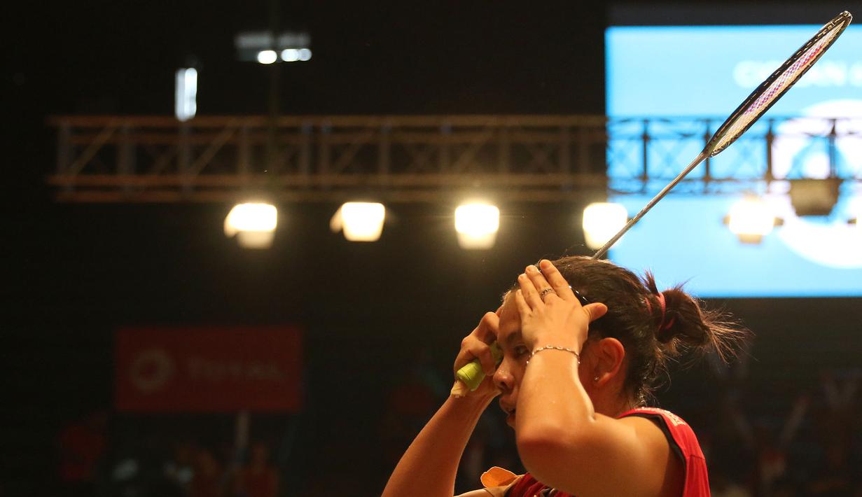 Greysia Polii berkonsentrasi penuh saat bertanding. (Bola.com/Arief Bagus)