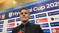 Pelatih Timnas Indonesia John Herdman saat memberi keterangan kepada awak media selepas drawing ASEAN Championship 2026 di Kebon Jeruk, Jakarta Barat, pada Kamis (15/1/2026). (Liputan6.com/Melinda Indrasari)