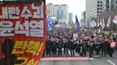 Mereka mendesak pemakzulan Presiden Korea Selatan Yoon Suk Yeol. (ANTHONY WALLACE/AFP)